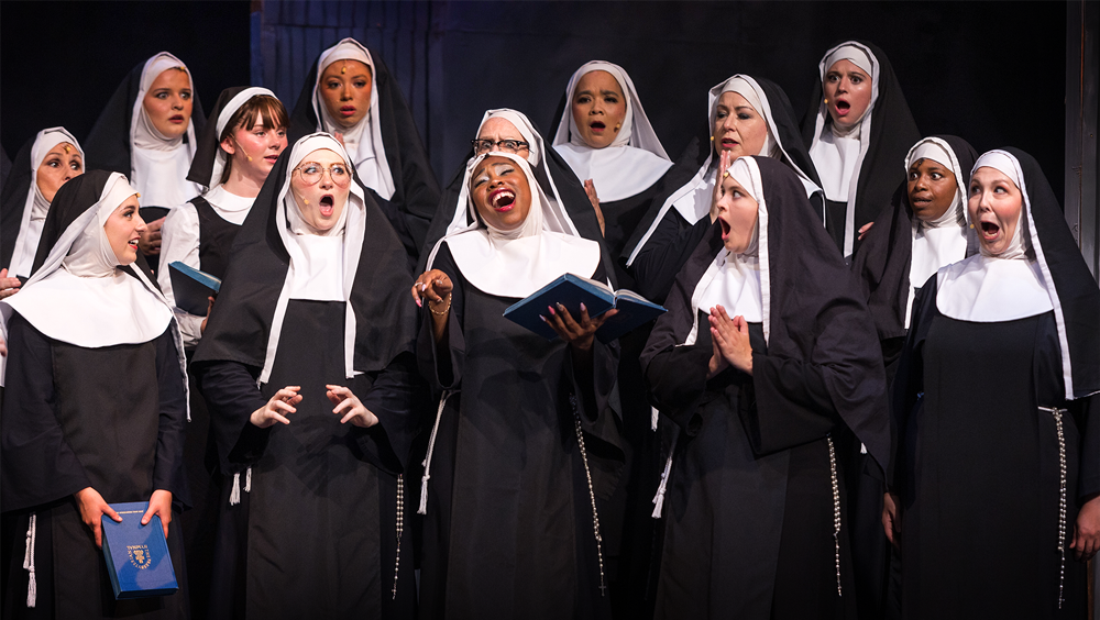 Nuns singing during choir rehearsal