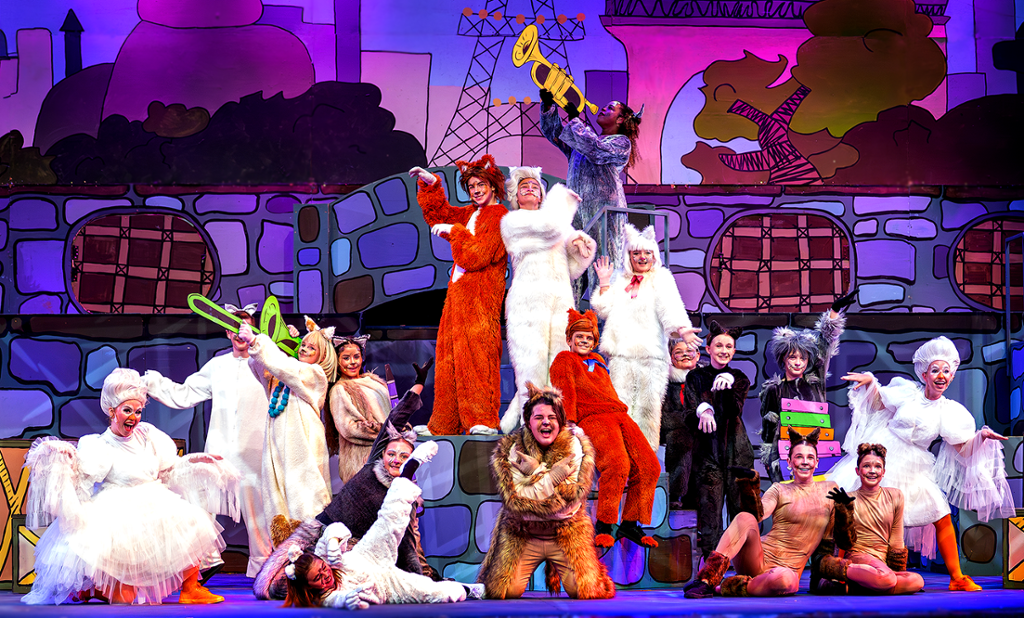 group of actors dressed as cats