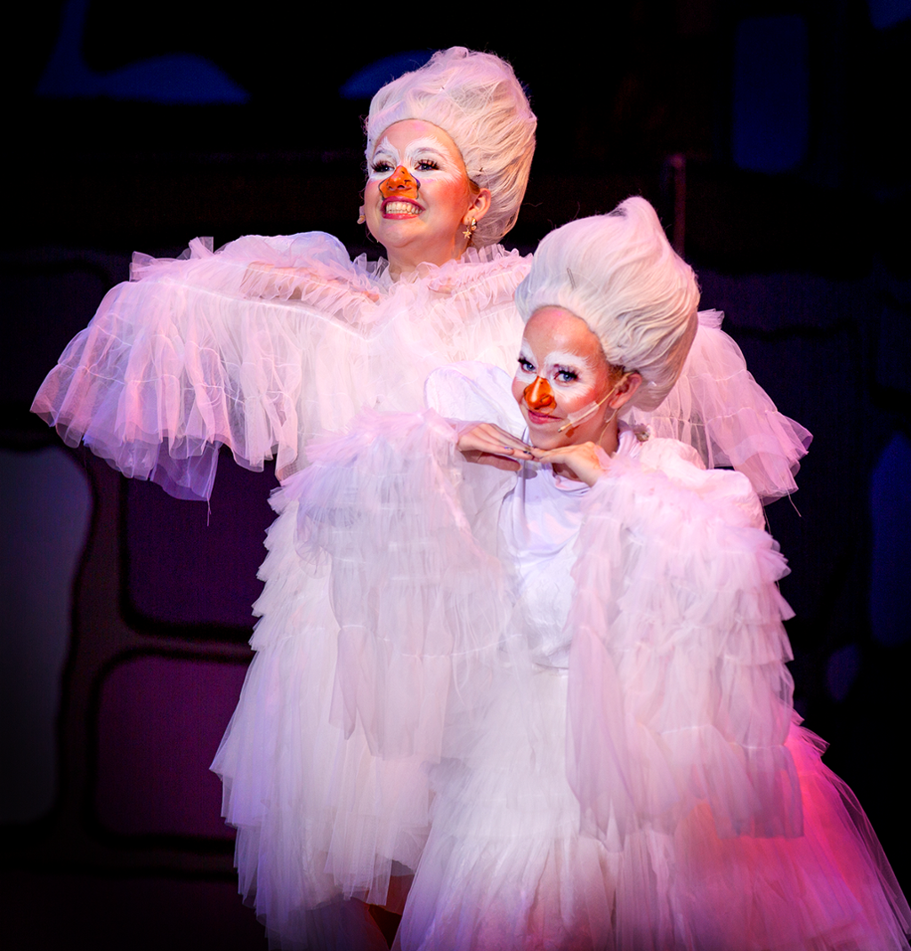 two actors dressed as geese